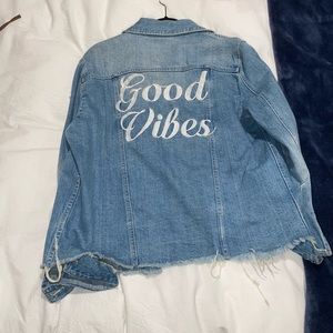 Pistola Blue Jean Jacket that says “Good Vibes”